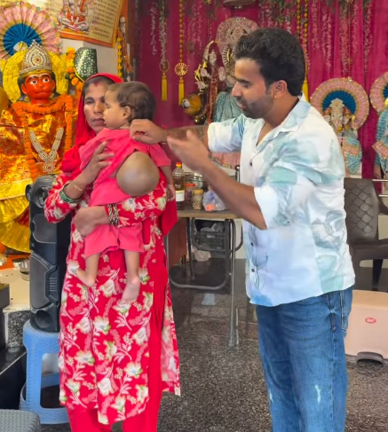 Gehna with her parents during a hospital visit