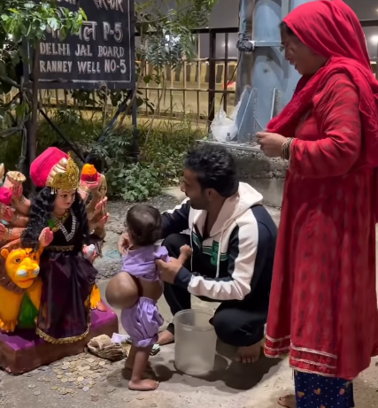 Gehna with her family at a temple